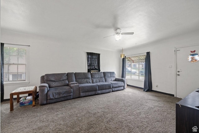 960 Patterson St, Ogden, UT 84403 - carpeted living area with plenty of natural light, ceiling fan, a textured ceiling, and baseboards
