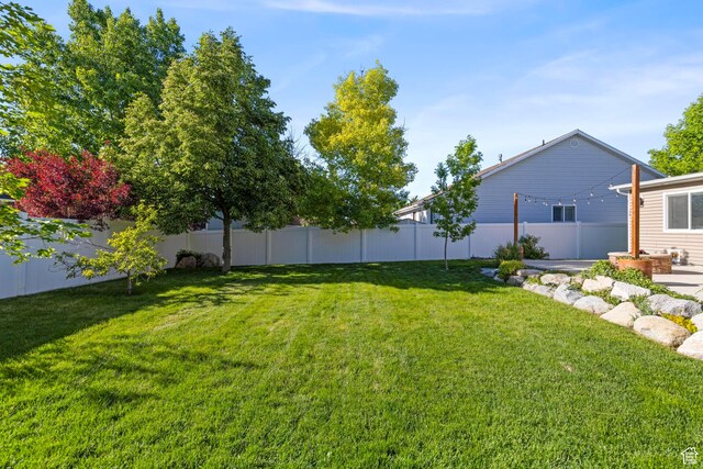 1933 N 120 W, Tooele, UT 84074 - view of yard featuring a patio area