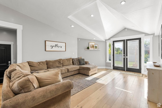 1933 N 120 W, Tooele, UT 84074 - living room with lofted ceiling, light wood-style flooring, french doors, baseboards, and recessed lighting