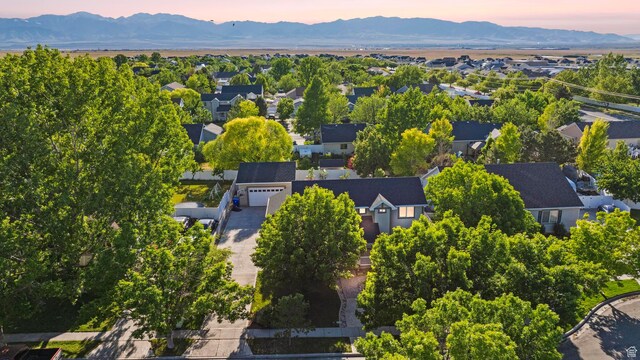 1933 N 120 W, Tooele, UT 84074 - aerial view at dusk of a mountain view and a residential view