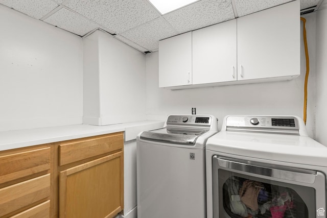 1933 N 120 W, Tooele, UT 84074 - laundry area featuring cabinet space and separate washer and dryer