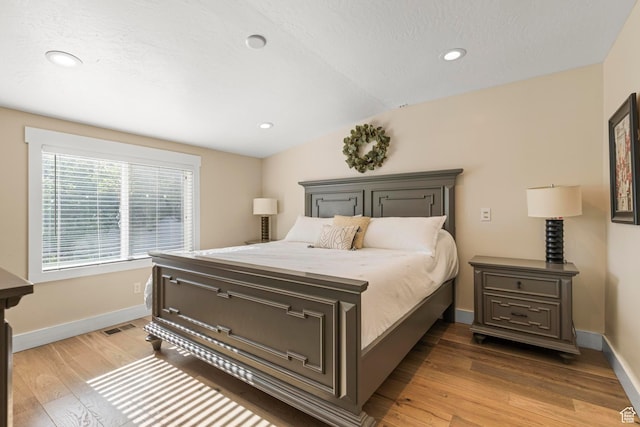 1933 N 120 W, Tooele, UT 84074 - bedroom with light wood finished floors, recessed lighting, and baseboards