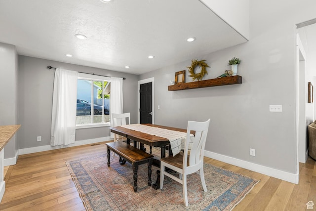 1933 N 120 W, Tooele, UT 84074 - dining space featuring light wood-style flooring, baseboards, and recessed lighting