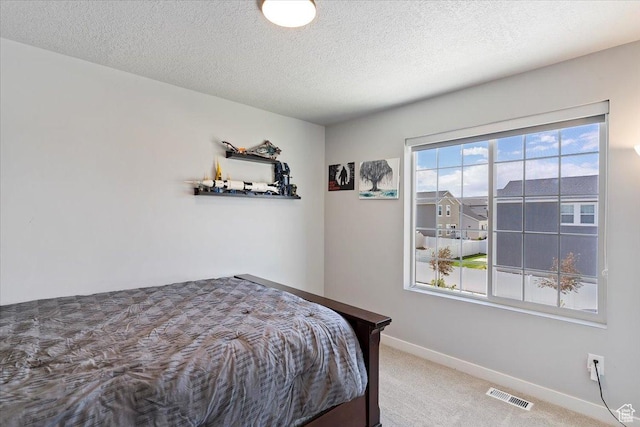 2221 W Prevedel Dr S, West Haven, UT 84401 - bedroom with carpet, baseboards, and a textured ceiling