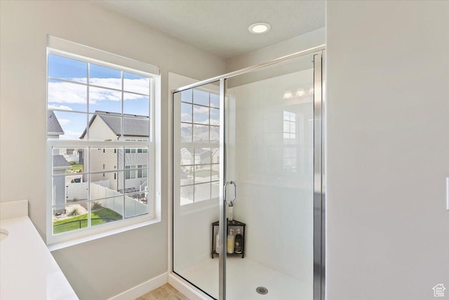 2221 W Prevedel Dr S, West Haven, UT 84401 - bathroom featuring a shower stall and baseboards