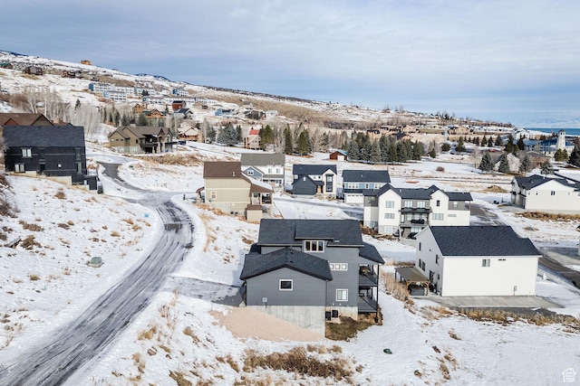 660 N Lochwood Dr # 69, Garden City, UT 84028 - snowy aerial view with a residential view