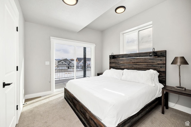 660 N Lochwood Dr # 69, Garden City, UT 84028 - carpeted bedroom with access to exterior and baseboards