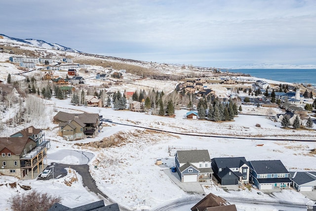 660 N Lochwood Dr # 69, Garden City, UT 84028 - snowy aerial view with a residential view and a mountain view