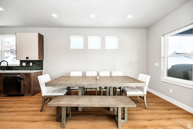 660 N Lochwood Dr # 69, Garden City, UT 84028 - dining area featuring recessed lighting, healthy amount of natural light, light wood-type flooring, and baseboards
