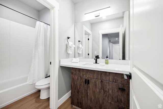 660 N Lochwood Dr # 69, Garden City, UT 84028 - bathroom with toilet, wood finished floors, vanity, shower / bath combo, and baseboards