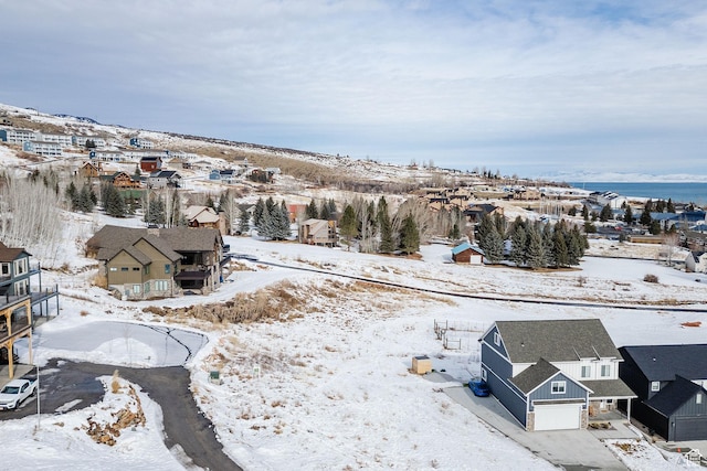 660 N Lochwood Dr # 69, Garden City, UT 84028 - snowy aerial view featuring a residential view