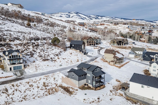 660 N Lochwood Dr # 69, Garden City, UT 84028 - snowy aerial view with a residential view and a mountain view