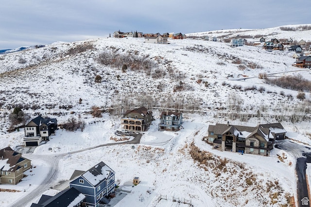 660 N Lochwood Dr # 69, Garden City, UT 84028 - snowy aerial view with a residential view and a mountain view