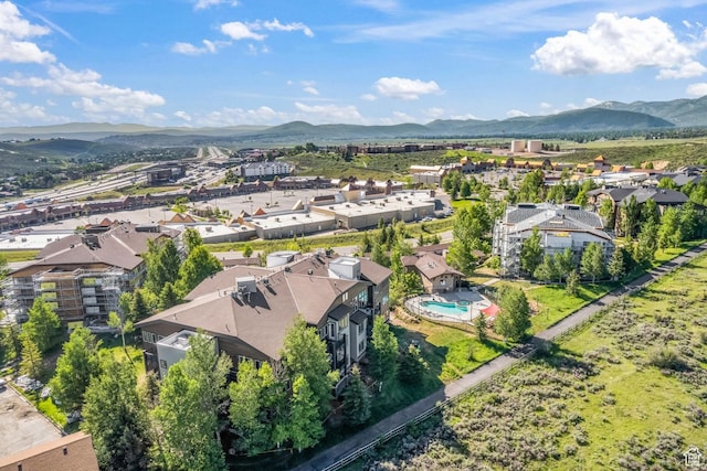 6749 N 2200 W Unit B102, Park City, UT 84098 - aerial view of a mountainous background and a pool area