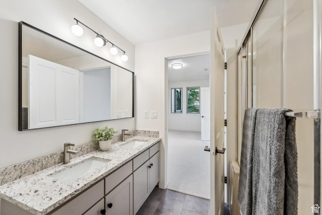 6749 N 2200 W Unit B102, Park City, UT 84098 - bathroom with double vanity and tile patterned floors