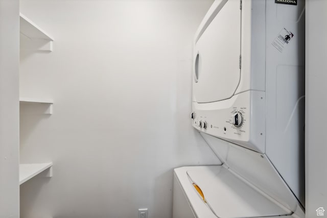 6749 N 2200 W Unit B102, Park City, UT 84098 - washroom with stacked washer and clothes dryer