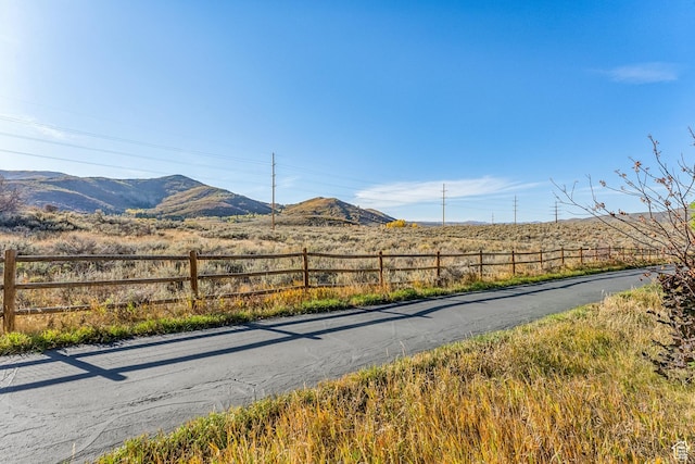 6749 N 2200 W Unit B102, Park City, UT 84098 - view of asphalt street featuring a mountain view