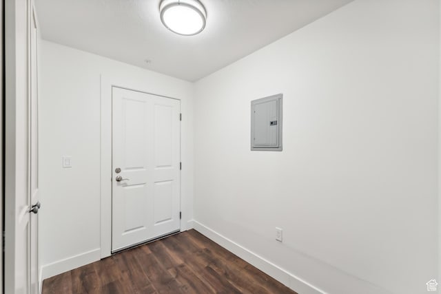 6749 N 2200 W Unit B102, Park City, UT 84098 - empty room with electric panel, baseboards, and dark wood finished floors