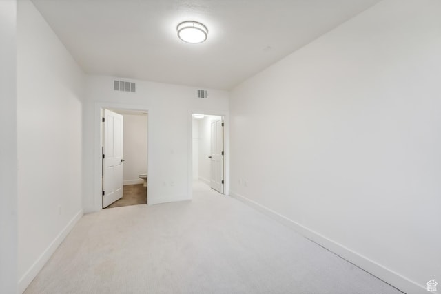 6749 N 2200 W Unit B102, Park City, UT 84098 - unfurnished bedroom with baseboards, carpet flooring, and connected bathroom