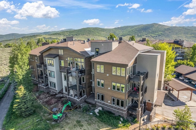 6749 N 2200 W Unit B102, Park City, UT 84098 - back of property with a mountain view and stucco siding