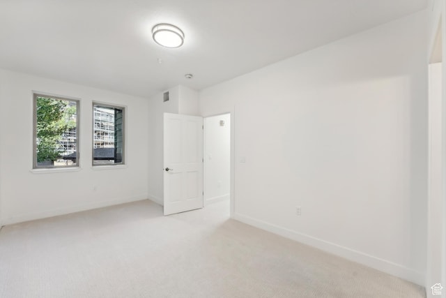 6749 N 2200 W Unit B102, Park City, UT 84098 - empty room featuring light carpet and baseboards