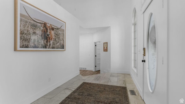 5557 W 13680 S, Herriman, UT 84096 - corridor with marble finish floors and baseboards