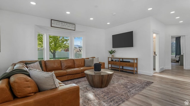 5557 W 13680 S, Herriman, UT 84096 - living room featuring light wood-style flooring, recessed lighting, and baseboards