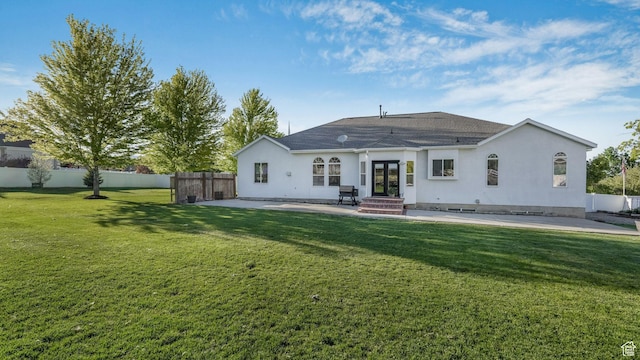 5557 W 13680 S, Herriman, UT 84096 - rear view of house with a patio, french doors, stucco siding, and entry steps