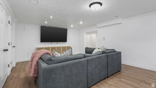5557 W 13680 S, Herriman, UT 84096 - living area with a textured ceiling, baseboards, light wood-style flooring, ornamental molding, and recessed lighting