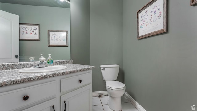 5557 W 13680 S, Herriman, UT 84096 - half bathroom with toilet, vanity, baseboards, and tile patterned floors