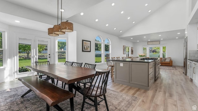 5557 W 13680 S, Herriman, UT 84096 - dining area with light wood-style flooring, recessed lighting, and high vaulted ceiling