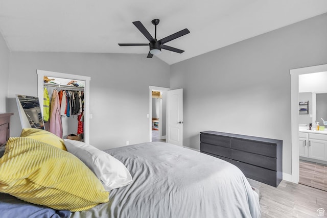 5131 W 6275 S, West Jordan, UT 84081 - bedroom with light wood-type flooring, vaulted ceiling, a closet, ensuite bath, and a spacious closet