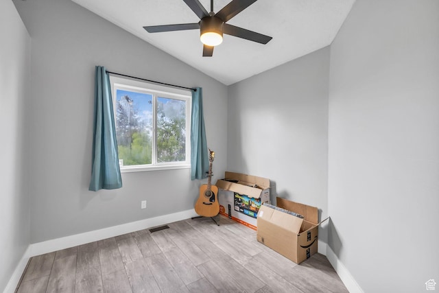 5131 W 6275 S, West Jordan, UT 84081 - unfurnished room featuring vaulted ceiling, a ceiling fan, wood finished floors, and baseboards