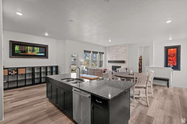 11242 S Willow Dr, South Jordan, UT 84009 - kitchen with a sink, dishwasher, dark cabinetry, light wood-type flooring, and recessed lighting