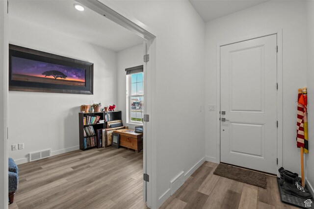 11242 S Willow Dr, South Jordan, UT 84009 - foyer entrance featuring wood finished floors and baseboards