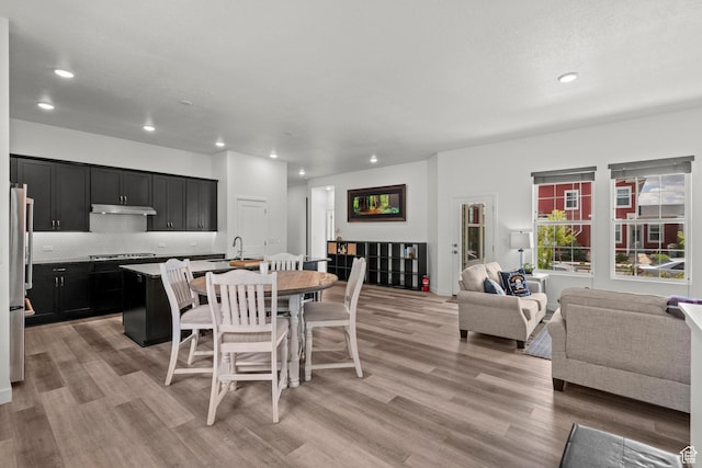 11242 S Willow Dr, South Jordan, UT 84009 - dining room with light wood-type flooring and recessed lighting