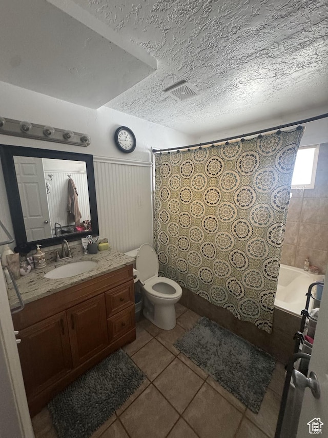197 E Utah Ave, Payson, UT 84651 - full bathroom featuring tile patterned flooring, vanity, a textured ceiling, toilet, and shower / bathtub combination with curtain