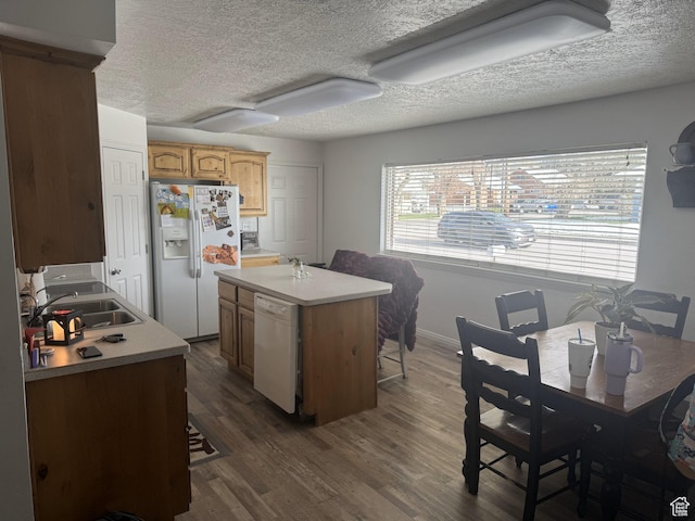 197 E Utah Ave, Payson, UT 84651 - kitchen with white appliances, a sink, a textured ceiling, dark wood-style flooring, and light countertops