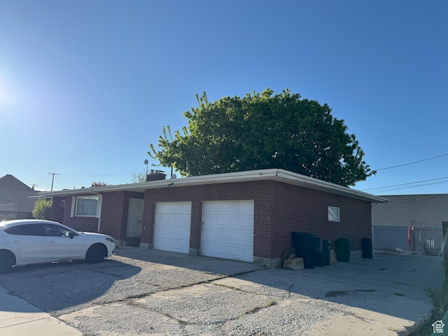 197 E Utah Ave, Payson, UT 84651 - view of front of home featuring brick siding and an attached garage