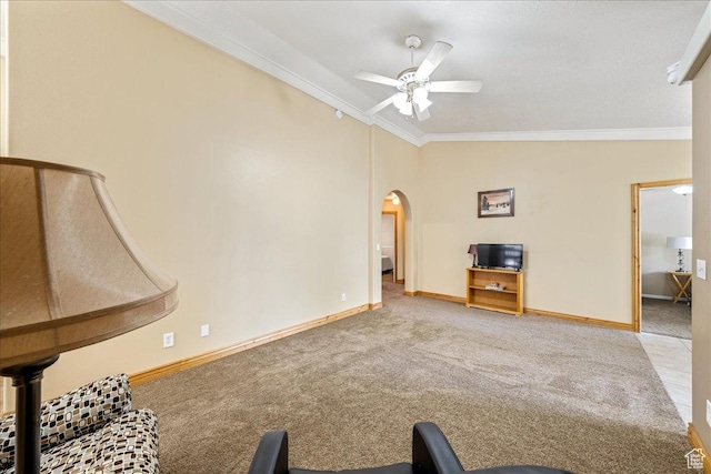 1040 N 1300th St Unit 52, St George, UT 84770 - unfurnished living room featuring ornamental molding, carpet, ceiling fan, vaulted ceiling, and arched walkways