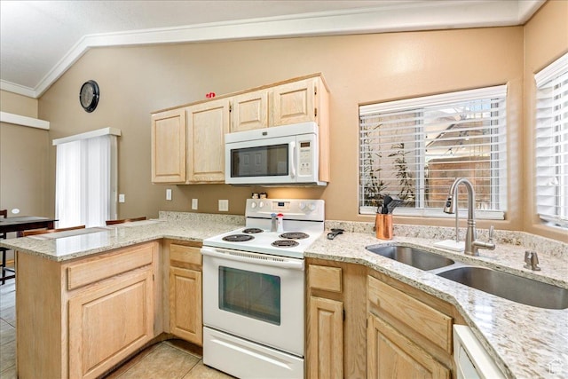 1040 N 1300th St Unit 52, St George, UT 84770 - kitchen featuring white appliances, light brown cabinetry, a sink, ornamental molding, and a peninsula