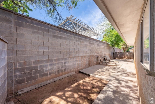1040 N 1300th St Unit 52, St George, UT 84770 - fenced backyard with a patio