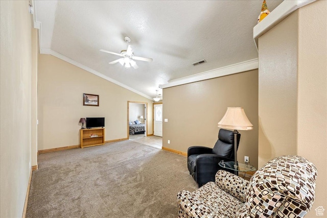 1040 N 1300th St Unit 52, St George, UT 84770 - living area featuring crown molding, a ceiling fan, lofted ceiling, baseboards, and carpet