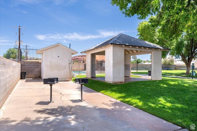 1040 N 1300th St Unit 52, St George, UT 84770 - view of patio / terrace with a gazebo and an outbuilding