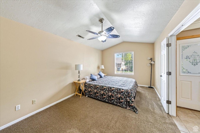 1040 N 1300th St Unit 52, St George, UT 84770 - bedroom featuring vaulted ceiling, light colored carpet, baseboards, a textured ceiling, and a ceiling fan