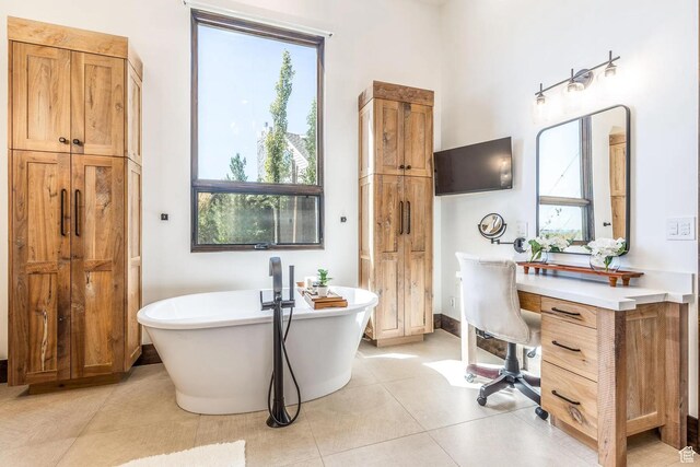 900 W Weber Canyon Rd, Oakley, UT 84055 - full bathroom with a soaking tub and tile patterned floors