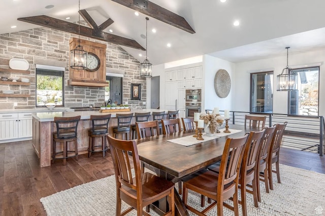 900 W Weber Canyon Rd, Oakley, UT 84055 - dining space with a chandelier, dark wood-style flooring, beamed ceiling, recessed lighting, and high vaulted ceiling