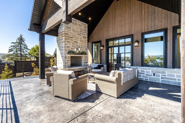 900 W Weber Canyon Rd, Oakley, UT 84055 - view of patio featuring french doors and an outdoor living space with a fireplace