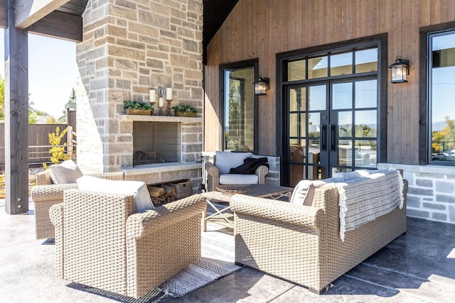 900 W Weber Canyon Rd, Oakley, UT 84055 - view of patio featuring french doors and an outdoor living space with a fireplace