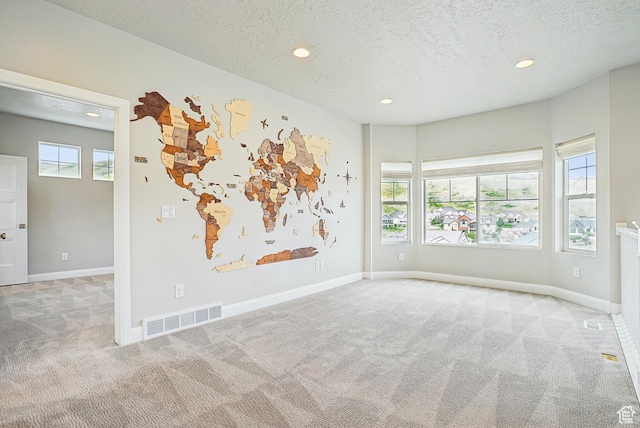 15056 S Sage Terrace Ln Unit 1014, Herriman, UT 84096 - carpeted spare room featuring a textured ceiling, recessed lighting, and baseboards
